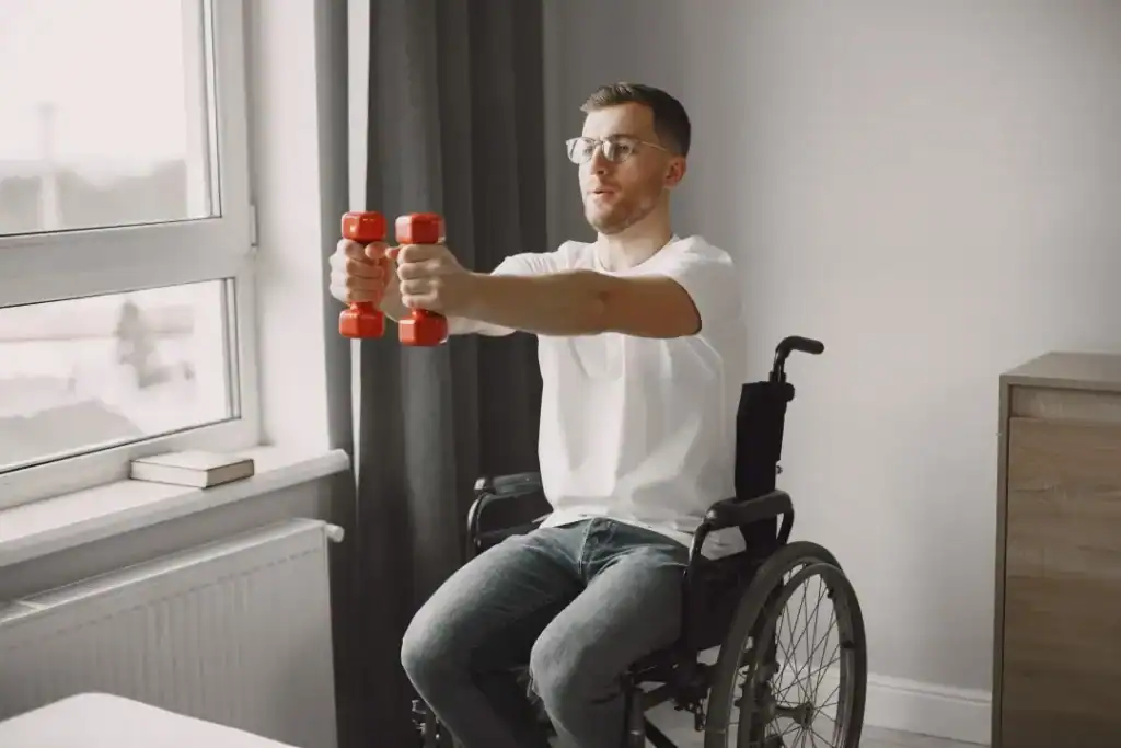 Image of man doing exercise in his wheelchair to aid weight loss Cheshire