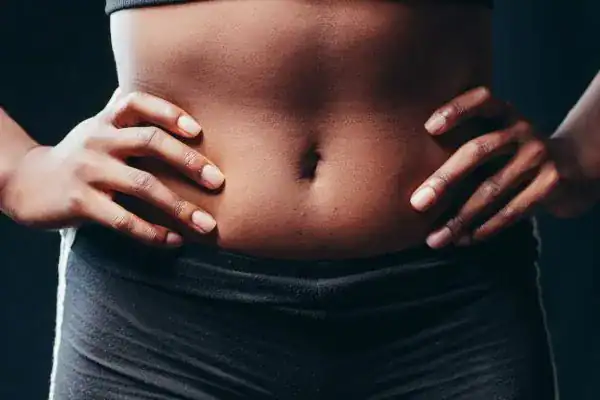 Toning Your Stomach: The Ultimate Guide to Achieving a Sculpted Stomach While Shedding Pounds 1 Image of a toned stomach after non surgical treatment Cheshire